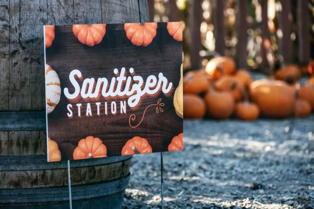 Celebrate Halloween Safely in your HOA/Condo during Covid-19 1 halloween covid 19 - image of pumpkins and a sanitizer station sign