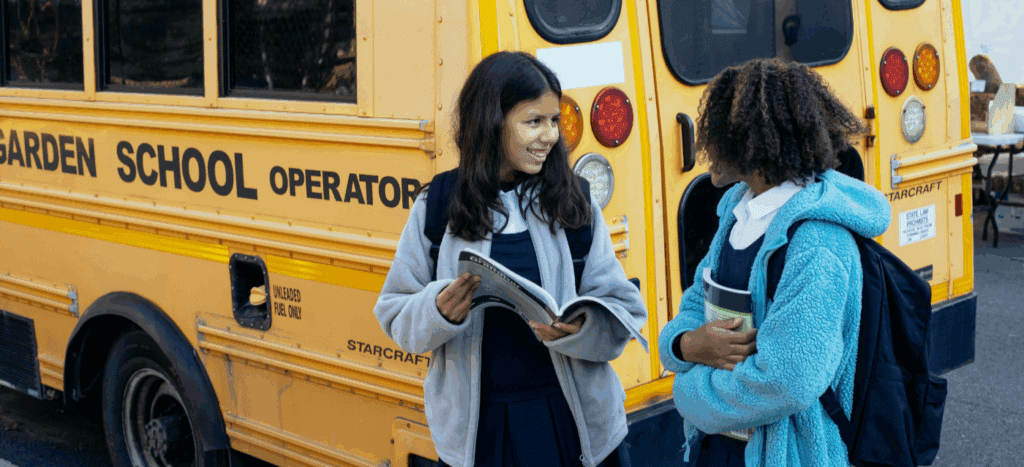 Back-to-School Season - Girls Waiting for the bus
