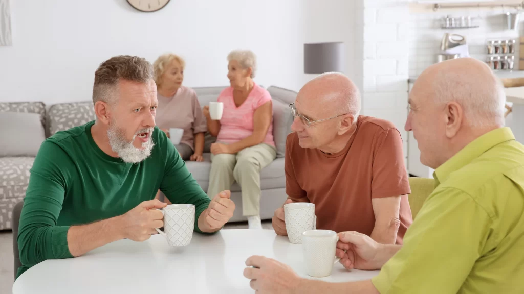 Benefits of Being on an HOA Board: Understanding Why to Be Part Of One 1 Benefits of being on an HOA board: 5 HOA board members having an informal meeting. They are having coffee and talking