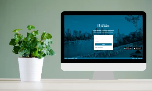 pot plant next to a computer with neigbrs by vinteum hoa portal login page