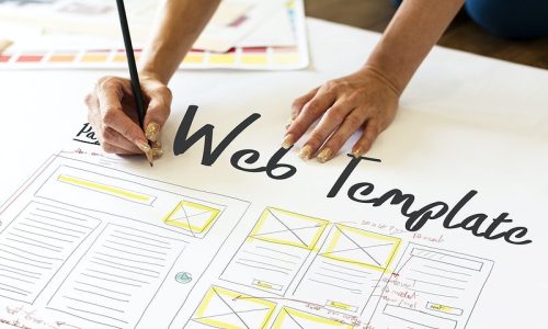 hoa website template - picture of a person writing web template
