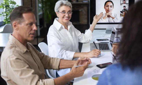 people using digital device while in a HOA executive session