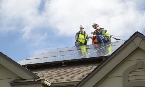 2 contractors working on a hoa roof replacement