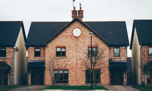 image of a brick house Purpose of an HOA - Image of a townhouse